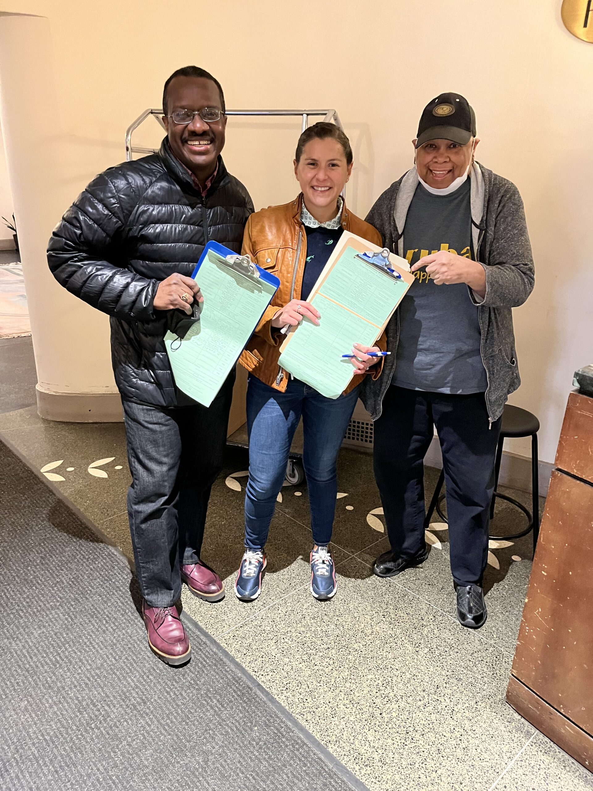 Philippe, Ilyssa, and a friend petitioning